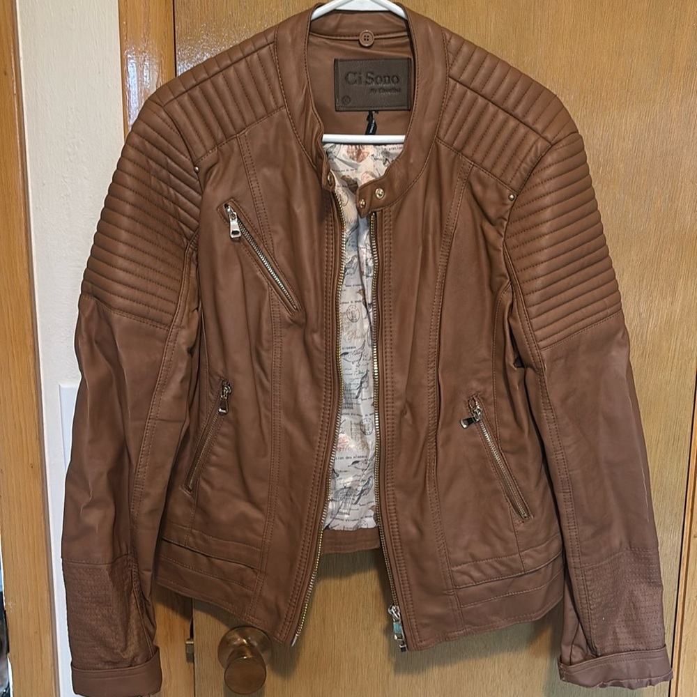 Brown leather jacket with gold details